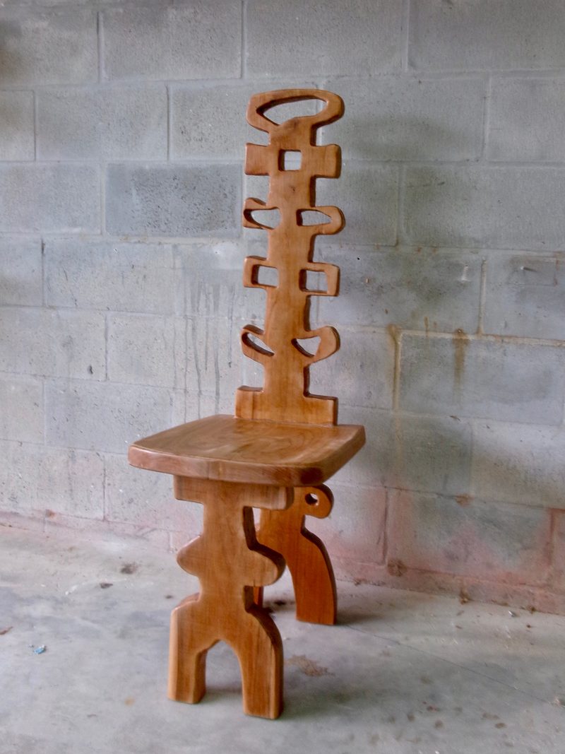 carved high back chair