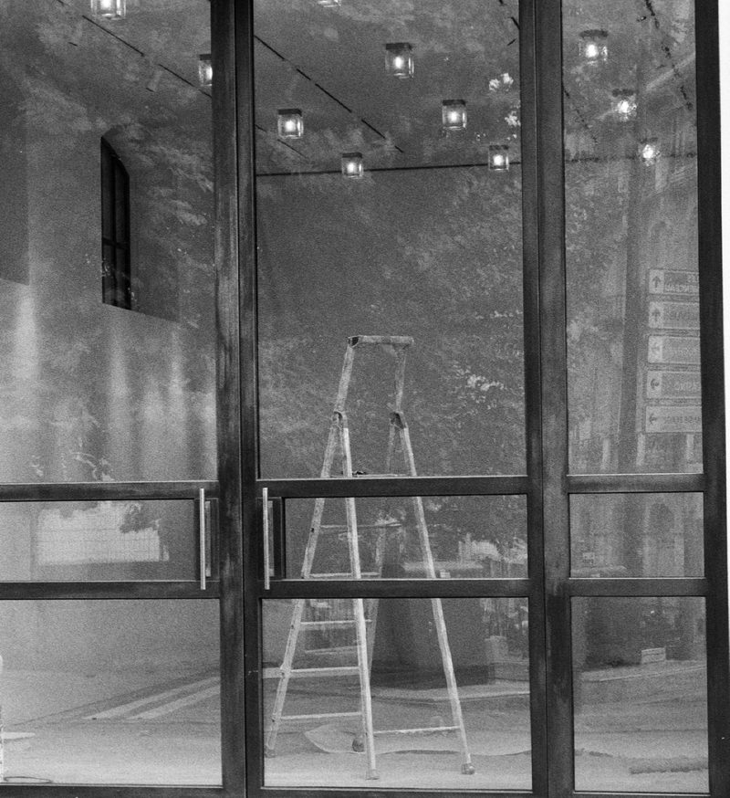 ladder behind glass