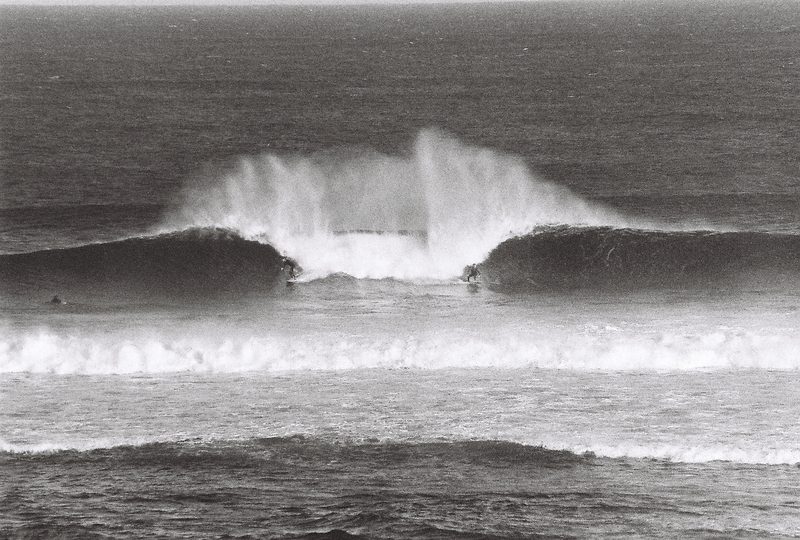 two surfers one wave